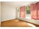 Bedroom featuring a backdoor leading to a porch area at 1007 E Callaway Sw Rd, Marietta, GA 30060