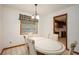 Bright dining area with neutral colored furniture and natural light at 1007 E Callaway Sw Rd, Marietta, GA 30060