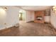 Rustic living room featuring a brick fireplace and archway to another room at 1007 E Callaway Sw Rd, Marietta, GA 30060