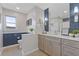 Contemporary bathroom with stylish blue tiling, modern cabinets, and double sink vanity at 1331 Dayspring Trce, Lawrenceville, GA 30045