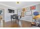 Sunlit living room with wood floors and neutral paint at 1331 Dayspring Trce, Lawrenceville, GA 30045