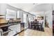 Functional kitchen with adjacent dining area and ample natural light at 6153 Idlewood Pass, Lithonia, GA 30038