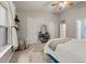 Bedroom with ceiling fan, neutral walls, lots of natural light, and access to an ensuite bath at 1152 Liberty Nw Pkwy, Atlanta, GA 30318