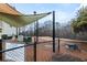 View of the community dog park with seating, shade covering, and pet waste station at 1152 Liberty Nw Pkwy, Atlanta, GA 30318