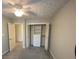 Neutral bedroom with carpet, ceiling fan, and closet at 2690 Twin Creek Ct, Marietta, GA 30062