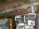 Aerial view of a rooftop deck with multiple seating areas and an outdoor kitchen at 675 Drewry Ne St # 602, Atlanta, GA 30306