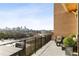 Outdoor balcony with great city views, dining table and chairs and additional seating at 675 Drewry Ne St # 602, Atlanta, GA 30306