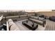 Relaxing rooftop deck boasts city views, stylish seating, and a cozy fire pit for entertaining at 675 Drewry Ne St # 602, Atlanta, GA 30306