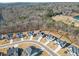 A beautiful new construction community featuring craftsman-style homes with sidewalks, trees, and backyard fencing at 2018 Stonecreek Dr, Woodstock, GA 30188