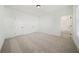 Spacious bedroom with neutral walls and an adjoining bathroom at 2018 Stonecreek Dr, Woodstock, GA 30188