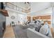 Bright and spacious living room with fireplace, open to kitchen, and hardwood flooring at 2018 Stonecreek Dr, Woodstock, GA 30188