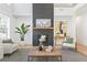 Comfortable living room featuring a floor to ceiling fireplace and neutral decor at 2018 Stonecreek Dr, Woodstock, GA 30188