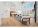 Spacious open-concept living room with soaring ceilings, hardwood floors, and tons of natural light at 2018 Stonecreek Dr, Woodstock, GA 30188