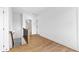 Bright hallway features hardwood floors and access to other rooms in this meticulously maintained home at 210 Regester Way, Peachtree City, GA 30269