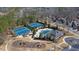 Aerial view of the community amenities including a pool, tennis courts, playground and clubhouse at 3966 Covey Flush Sw Ct # 20, Smyrna, GA 30082