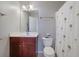 Bathroom featuring a dark wood vanity, and a shower-tub combination at 3966 Covey Flush Sw Ct # 20, Smyrna, GA 30082