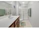 This bathroom offers a single sink vanity and a glass-enclosed shower at 3966 Covey Flush Sw Ct # 20, Smyrna, GA 30082