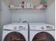 Laundry room with modern Samsung washer and dryer units at 3966 Covey Flush Sw Ct # 20, Smyrna, GA 30082