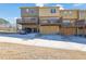 Exterior showcasing townhome patios, garage access, and a manicured lawn at 3966 Covey Flush Sw Ct # 20, Smyrna, GA 30082
