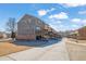 Townhome exteriors with patios, garages, and well-maintained backyards at 3966 Covey Flush Sw Ct # 20, Smyrna, GA 30082