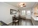 Well-lit dining area with hardwood floors, classic furniture, and a back door at 125 N River Dr # F, Atlanta, GA 30350