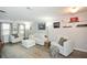 Bright living room with contemporary furniture and wood-look floors at 125 N River Dr # F, Atlanta, GA 30350