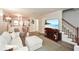 Comfortable living room with hardwood floors, a fireplace, and modern decor at 125 N River Dr # F, Atlanta, GA 30350