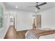Bright bedroom features hardwood floors and an ensuite bathroom at 4770 Wayland Cir, Acworth, GA 30101