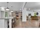 Spacious and bright living area with fireplace, eat-in island and hardwood floors at 4770 Wayland Cir, Acworth, GA 30101