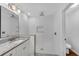Modern bathroom featuring tiled walk-in shower, and granite vanity with sink at 4770 Wayland Cir, Acworth, GA 30101