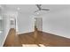 Hardwood bedroom with bright view to the en suite bath, closet and entry at 4770 Wayland Cir, Acworth, GA 30101