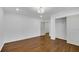 Bright bedroom featuring hardwood floors, neutral paint, and a closet at 4770 Wayland Cir, Acworth, GA 30101
