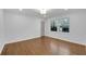 Bright bedroom with hardwood flooring, recessed lights, and a large window at 4770 Wayland Cir, Acworth, GA 30101