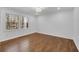 Bedroom featuring hardwood floors, natural light from the windows, and recessed lighting at 4770 Wayland Cir, Acworth, GA 30101
