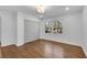 Bedroom with hardwood floors and natural lighting coming through large windows at 4770 Wayland Cir, Acworth, GA 30101