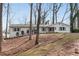 Exterior of the house with green shutters showing the front yard with mulch at 4770 Wayland Cir, Acworth, GA 30101