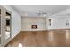 Living room with fireplace, neutral paint, hardwood floors, and exterior doors at 4770 Wayland Cir, Acworth, GA 30101