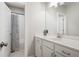 Clean bathroom featuring a vanity with ample counter space and a shower/tub combination with stylish curtain at 11 Ganel Ln, Alpharetta, GA 30009