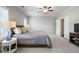 Bright bedroom with a ceiling fan, neutral carpet and window shutters at 11 Ganel Ln, Alpharetta, GA 30009