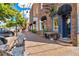 Charming storefront on a brick sidewalk, with outdoor seating and retail shops nearby at 11 Ganel Ln, Alpharetta, GA 30009