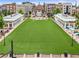 Aerial view of a town green space in an outdoor shopping center with restaurants and shops at 11 Ganel Ln, Alpharetta, GA 30009