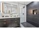 Modern bathroom featuring a double vanity, stylish fixtures, and a walk-in shower at 176 Rhodesia Se Ave, Atlanta, GA 30315