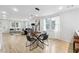 Inviting living and dining space featuring hardwood floors and abundant natural light at 176 Rhodesia Se Ave, Atlanta, GA 30315