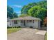 Charming single-story home with manicured lawn and concrete driveway at 1857 Dunlap Ave, East Point, GA 30344