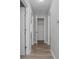 Hallway featuring modern gray walls and wood-look flooring at 1857 Dunlap Ave, East Point, GA 30344