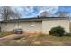 A picture of the back exterior and patio of a house at 4027 Gladesworth Ln, Decatur, GA 30035