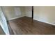 Hardwood flooring throughout the living room and neutral-toned walls at 4027 Gladesworth Ln, Decatur, GA 30035