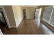 Bright living room featuring hardwood floors, neutral paint, and natural light at 4027 Gladesworth Ln, Decatur, GA 30035