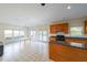 Spacious kitchen featuring an island, stainless steel appliances, eat-in breakfast area and tile flooring at 1220 Downyshire Dr, Lawrenceville, GA 30044