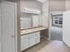Bright bathroom features a single vanity with a shower and toilet in a separate room at 1394 Orchard Park Dr, Stone Mountain, GA 30083